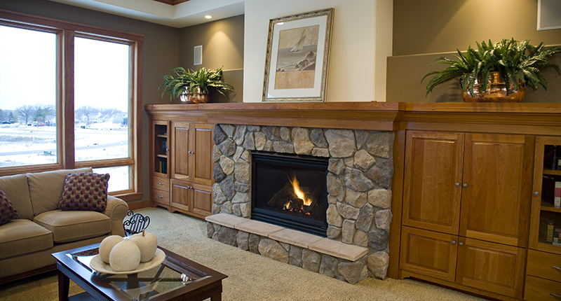 Winter Fireplace in Living Room with Boulder Creek Manufactured Stone